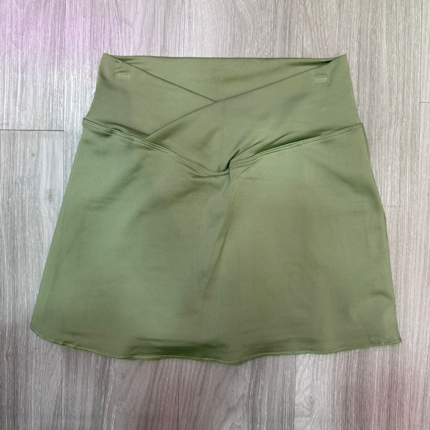 Falda short pretina cruzada